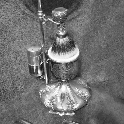 1915 Shaving mirror.